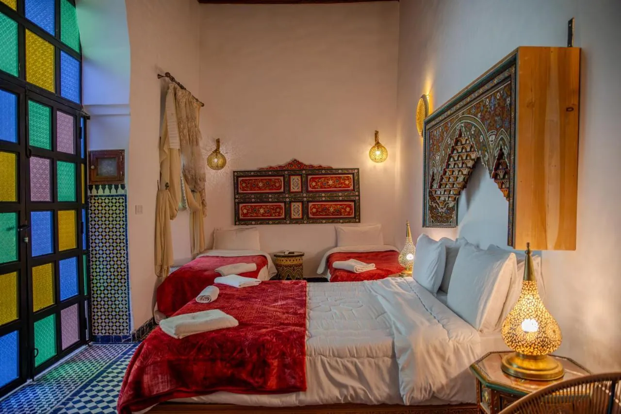 Colourful twin guest room with Moroccan details